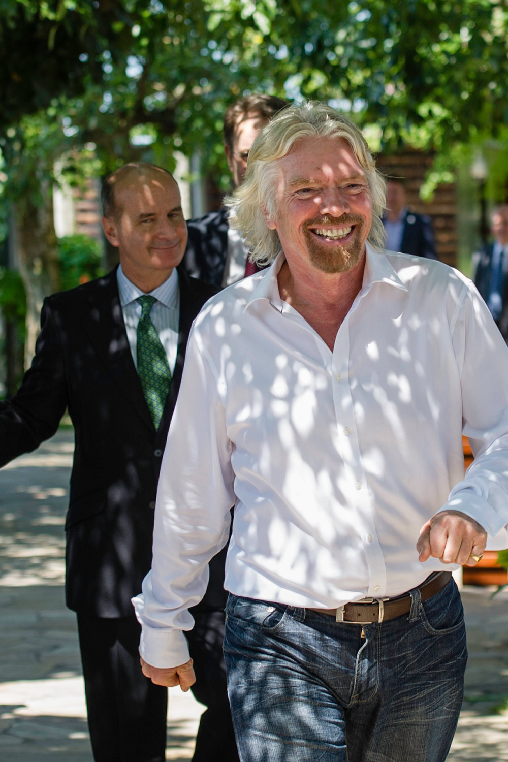 Richard Branson smiling with Jose Figueres